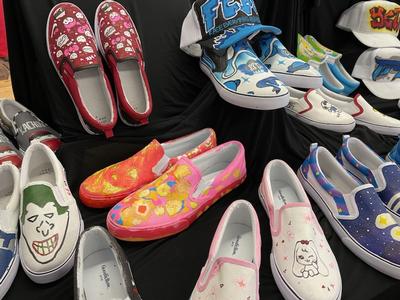 This is a photo of some of the shoes ITC art students created.